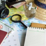 diary and calendar with passport and map